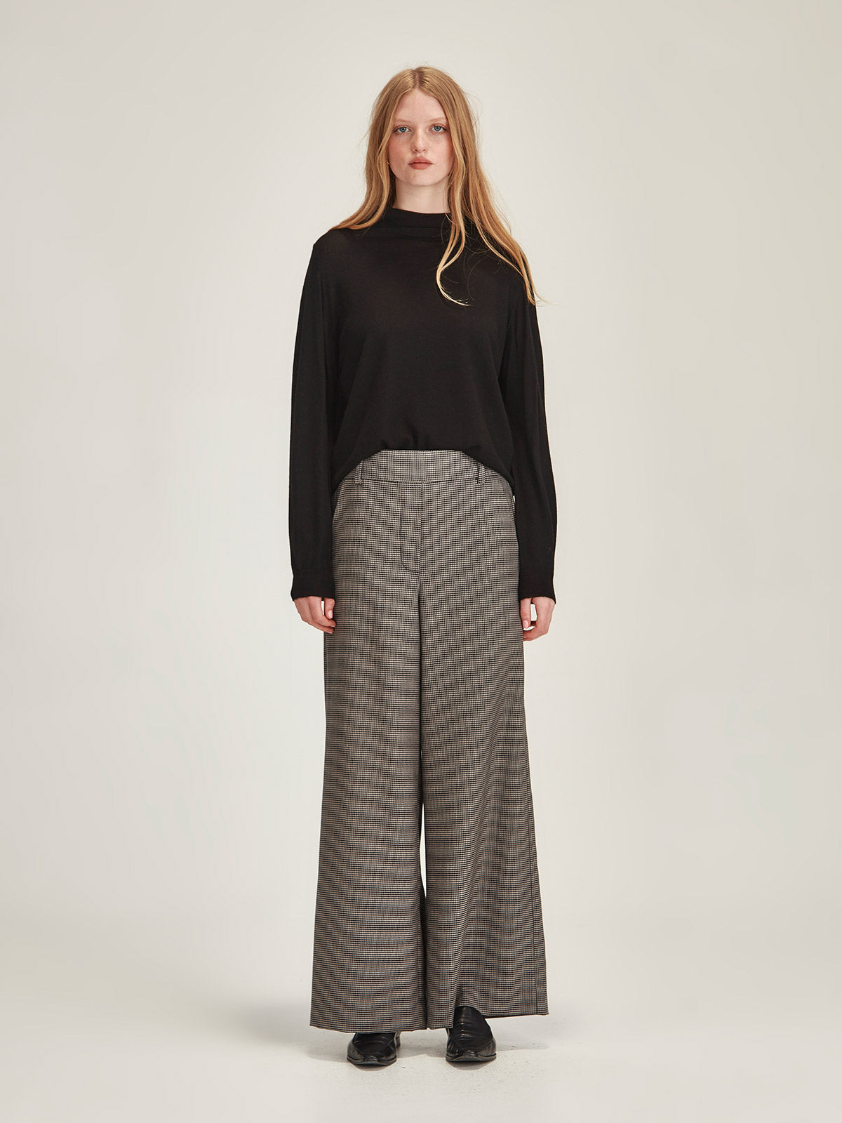 Women's black Nita Cashmere Funnel Neck front view - Caroline Sills premium long sleeve, fine cashmere sweater